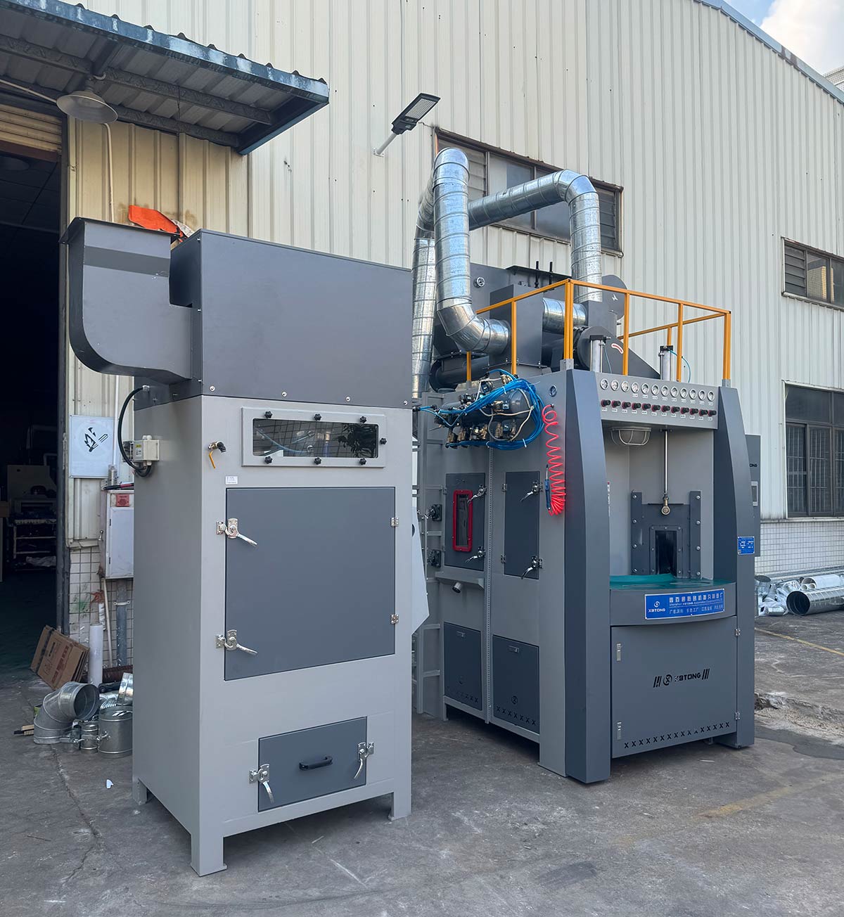 深圳伟德国际1946bv官网间歇/连续式转盘自动喷砂机实拍图片